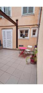 Un balcón o terraza en Montagnard RDC Hyper centre