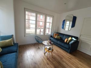 Posezení v ubytování 04- La Potinière- Proche Plage - RDC avec Terrasse- Parking gratuit