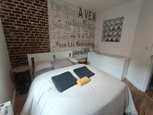 Postel nebo postele na pokoji v ubytování 04- La Potinière- Proche Plage - RDC avec Terrasse- Parking gratuit