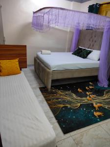 Una cama o camas en una habitación de Lulu house