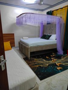 Una cama o camas en una habitación de Lulu house