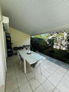 En balkon eller terrasse på Palm'Ô Zen