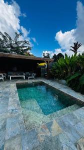 Swimmingpoolen hos eller tæt på Palm'Ô Zen