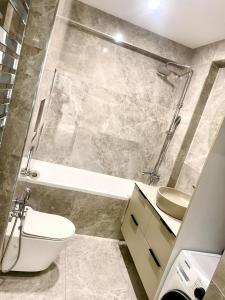 Baðherbergi á Air-Hotel Moldova +86 myndir