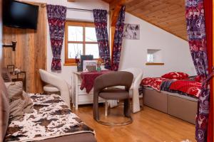 Postel nebo postele na pokoji v ubytování Designer-Chalets
