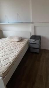 En eller flere senge i et værelse på Lodelinsart