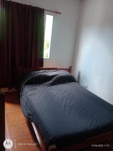 En eller flere senge i et værelse på Complejo Don Joaquin 1