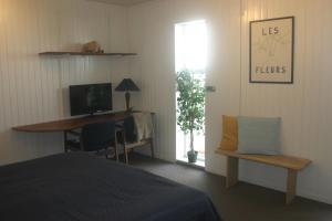 TV a/nebo společenská místnost v ubytování Privatleje B&NoB