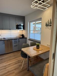 Kuchyň nebo kuchyňský kout v ubytování Appartement Schmid