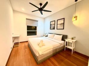 Giường trong phòng chung tại Apartment KL Luxury Home Stay