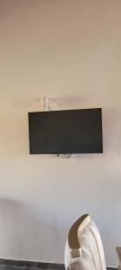 Et tv og/eller underholdning på Casa Los Acacios Piso 2