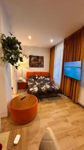 Et tv og/eller underholdning på Miodowy apartament + 15 billeder