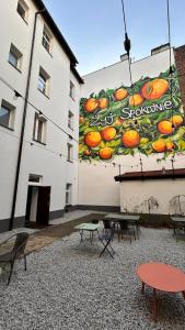 a building with a sign on the side of it at Miodowy apartament in Chorzów