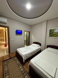 Ένα ή περισσότερα κρεβάτια σε δωμάτιο στο Hotel Celiku +53 φωτογραφίες