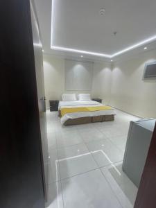 Postel nebo postele na pokoji v ubytování manasek hotel