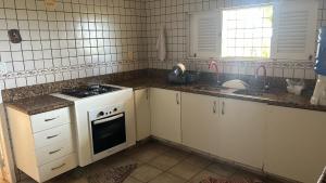 Køkken eller tekøkken på Casa beira mar Itamaracá + 7 billeder