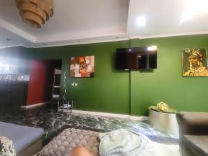 Et tv og/eller underholdning på Hilltop Villa Chez Coco