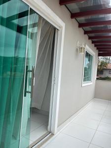 En balkon eller terrasse på Búzios apartamento paraíso lll