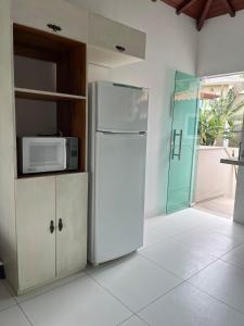 Køkken eller tekøkken på Búzios apartamento paraíso lll