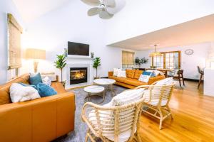 Un televizor și/sau centru de divertisment la Orleans Holiday House