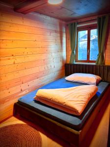 Postel nebo postele na pokoji v ubytování Ida`s Hüs