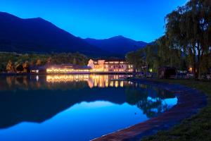 a view of a lake at night at Hotel Don Luis in Castel di Sangro
