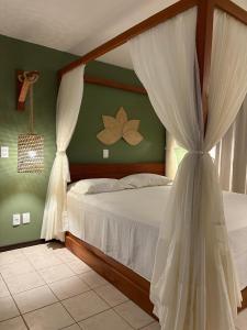 Ένα ή περισσότερα κρεβάτια σε δωμάτιο στο Lagoa Eco Village +112 φωτογραφίες