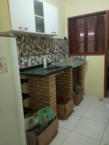 Køkken eller tekøkken på Casa três com cozinha compartilhada