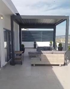 En balkon eller terrasse på Superbe appartement residence Kalia Front de terre