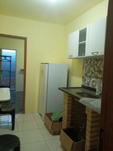 Køkken eller tekøkken på Casa três com cozinha compartilhada