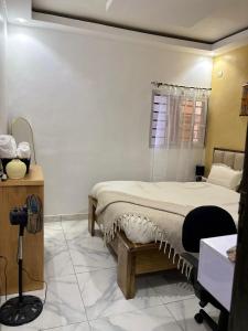 Ένα ή περισσότερα κρεβάτια σε δωμάτιο στο MinoB Residence, T2- Apartment