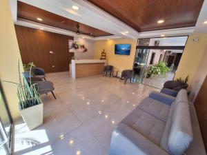 Телевизор и/или развлекательный центр в Hotel Brasil