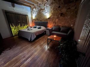 En eller flere senge i et værelse på Blanco de Malbec 1 + 21 billeder