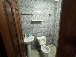 Ванная комната в Chez Khady et Bak