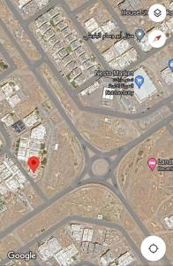 eine Karte einer Stadt mit Gebäuden und Straßen in der Unterkunft Raha rooms in Seeb + 2 Fotos