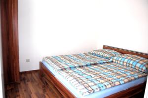 Una cama o camas en una habitación de Family Apartment - Ferienwohnumg im Südburgenland
