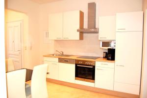 Una cocina o cocineta en Family Apartment - Ferienwohnumg im Südburgenland