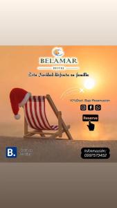 a christmas card with a santa hat sitting in a chair at Hotel Belamar in La Libertad