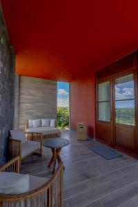 Χώρος καθιστικού στο Casa Raíces Hotel Luxury & Viñedo