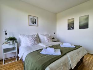 En eller flere senge i et værelse på Parkapartment mit Grünblick nahe Zentrum