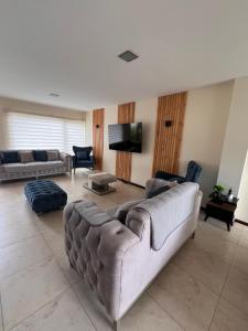 Un lugar para sentarse en Tu refugio de lujo en Cuenca!