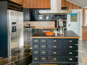 Køkken eller tekøkken på Modern Cabin With Ski In-Out In Hafjell