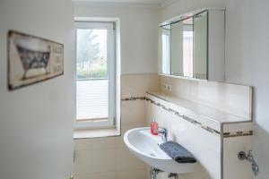 Koupelna v ubytování Claras Gartenblick + 118 fotografií