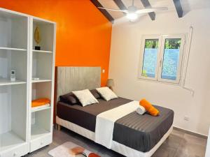 En eller flere senge i et værelse på Le bien-être de la nature