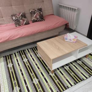 a living room with a couch and a coffee table at Tunisia la Goulette in Tunis