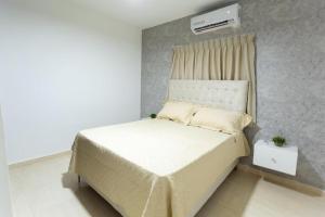 Ένα ή περισσότερα κρεβάτια σε δωμάτιο στο MB Apartment