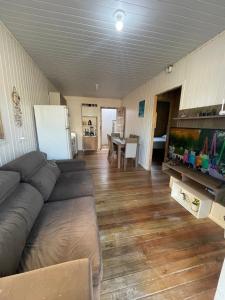 Et opholdsområde på Casa pé na areia em capão da canoa