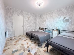 Postel nebo postele na pokoji v ubytování Guest House - MXP, Lakes, Leonardo, 2 bedrooms