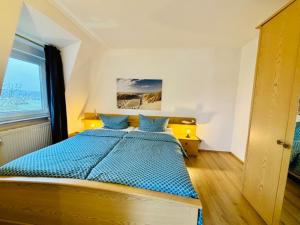 En eller flere senge i et værelse på Apartmenthaus-Usedom Kajüte 12