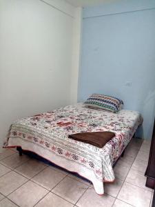 Postel nebo postele na pokoji v ubytování Casa Magdalena Centro